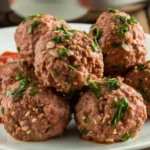 Plant-based maple breakfast sausage patties on wooden plate